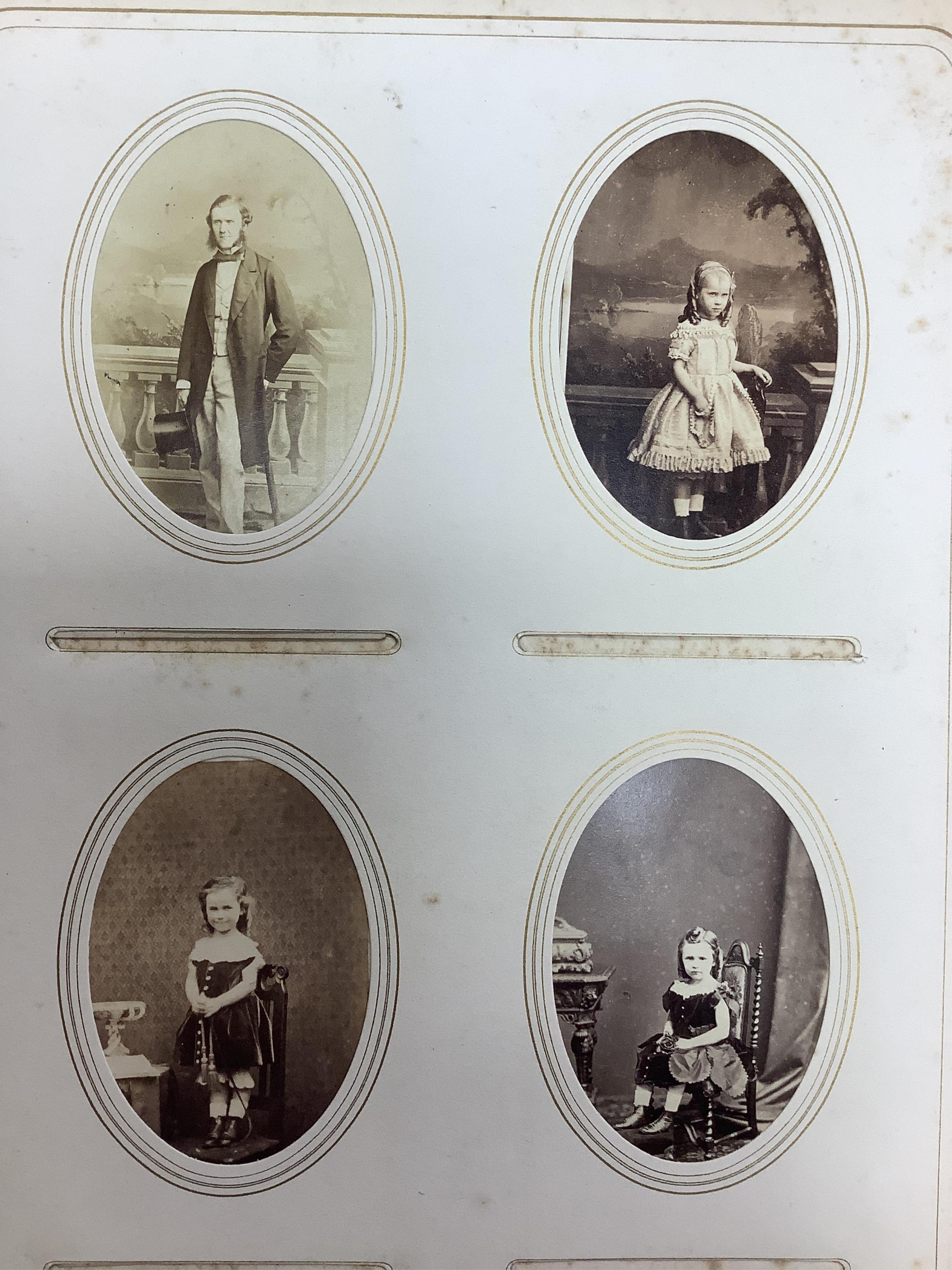 A Victorian malachite mounted amboyna family photograph album, 23cm x 30cm